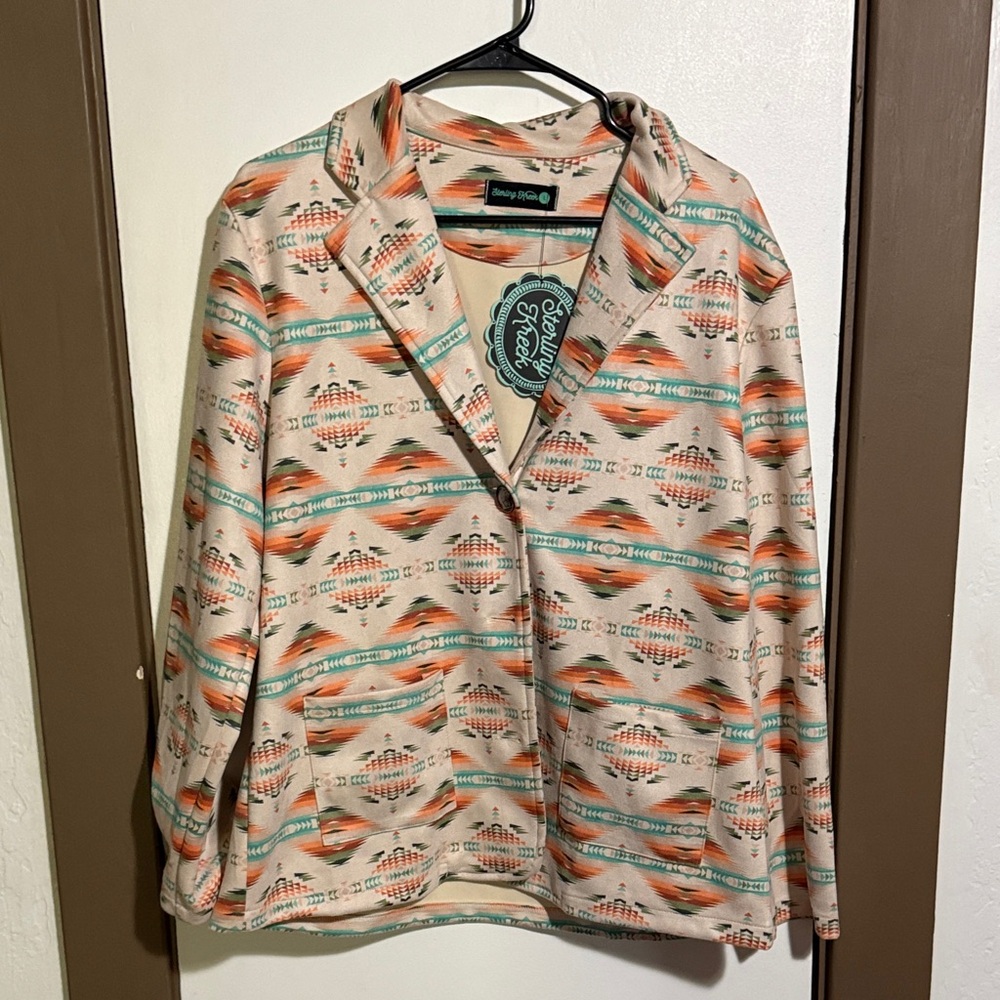 Trendy Tribal Print Jacket/Blazer. Has pockets and cute buffalo buttons!